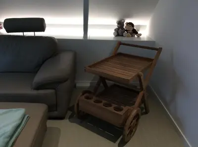 a living room with a coffee table and a couch at Biotina in Lebbeke