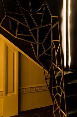 a spiral staircase in a room with a stair case at Harmon House - Hotel & Spa in Brussels