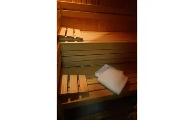 an empty sauna with a towel sitting in it at De Loteling in Zoersel