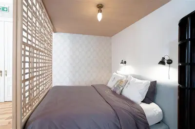 a bedroom with a bed in a room at 22b&b in Antwerp