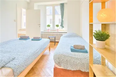 a bedroom with two beds in a room at Penth A Apartment in Heart of Antwerp in Antwerp