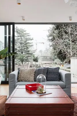 a living room with a couch and a coffee table at Flemishome, The Retreat For Family And Friends in Halle