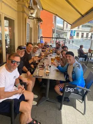 a group of people sitting at a table at Hotel Malon in Leuven