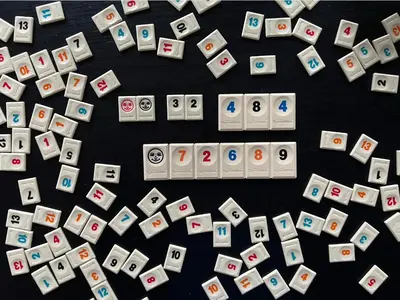 a bunch of playing cards on a table at La bellétage by Agelandkaai be with Free Parking in Ghent