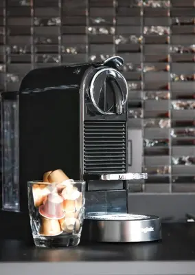 a toaster sitting on top of a table with a bowl of food at Lusandre in Olen
