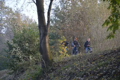a group of people riding bikes down a hill at Ars Vivendi in Moerbeke
