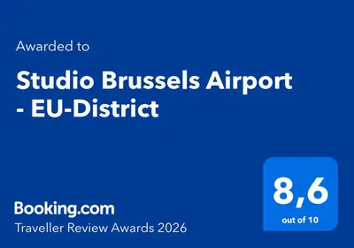 a blue sign that reads studio brushes airport eu district at Studio Brussels Airport - EU-District in Zaventem