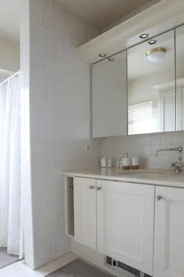 a bathroom with a sink and a mirror at The Loft in Melsele