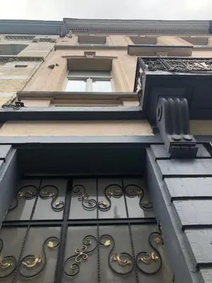 a window of a building with at Prestige Flats Coteaux in Brussels