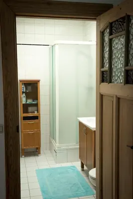 a bathroom with a toilet and a sink at Henriëtta in Hoboken