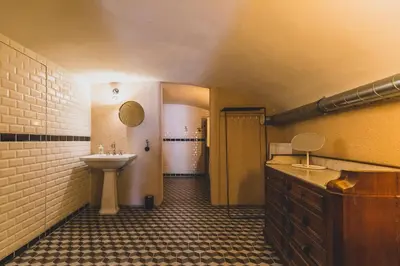 a bathroom with a sink and a toilet and a sink at The Hide in Ghent