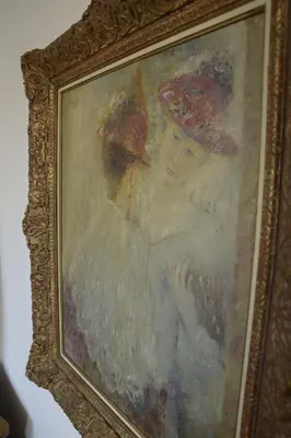 a painting of a woman wearing a hat at Artist's Loft & Garden in Ghent