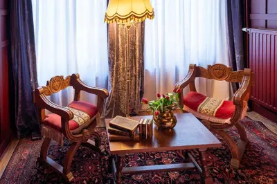 a living room with two chairs and a table at Spirella in Brussels