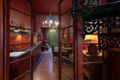 a kitchen with a table and a dining room at Spirella in Brussels