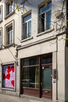 a building with a store front with windows at Spirella in Brussels
