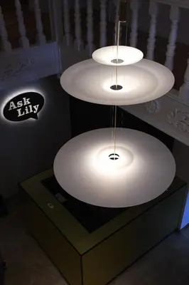 two white lights on top of a dresser at Ask Lily in Westmeerbeek