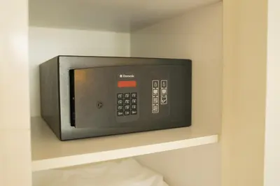 a microwave on a shelf in a room at B-aparthotel Grand Place in Brussels