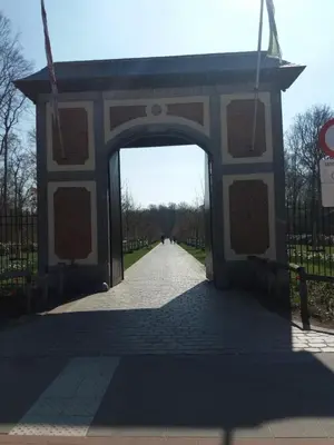 an archway at the entrance to a park at Quiet apartment in Antwerp near parc - B&B InterMezzo - business & leisure in Antwerp