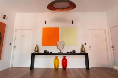 two vases on a table in a room at Les Lofts d'Artistes in Brussels