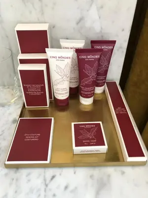 a group of four products sitting on a shelf at Merveilleux in Ghent