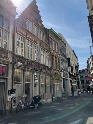 a group of buildings on a city street at Merveilleux in Ghent