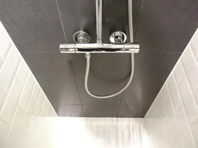 a shower in a bathroom with a sink at B&B Welcome To My Place in Brussels
