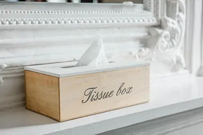 a wooden tissue box sitting on a shelf at Boutique hotel Roosendaelhof in Geel