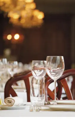 two empty wine glasses sitting on a table at Hotel Geerts in Westerlo
