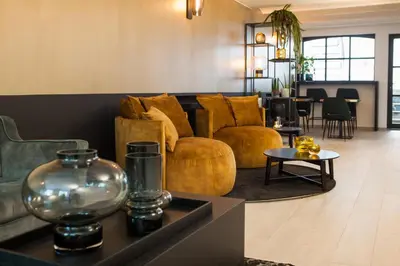 a living room with a couch and a table at B in Antwerp in Antwerp