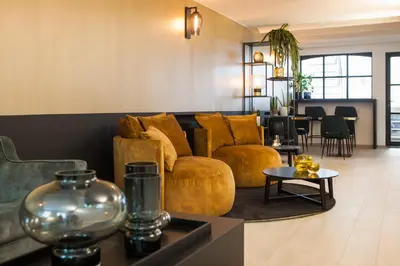 a living room with a couch and a table at B in Antwerp in Antwerp