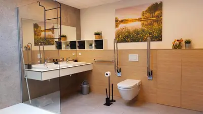 a bathroom with a toilet and a sink at Vakantiewoning De Schuur Tienen in Tienen