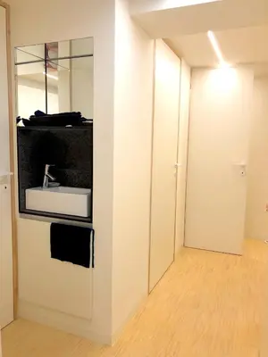 a bathroom with a sink and a mirror at Desk Till Dawn in Ghent