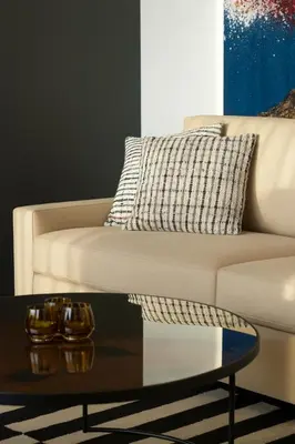 a living room with a couch and a coffee table at OFF in Wavre