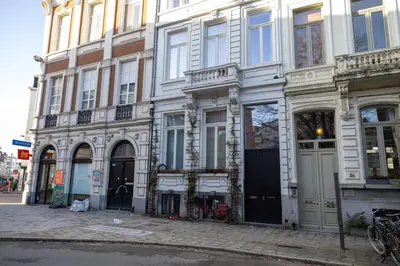 a building on a street with bikes parked in front of it at Heaven in Antwerp in Antwerp