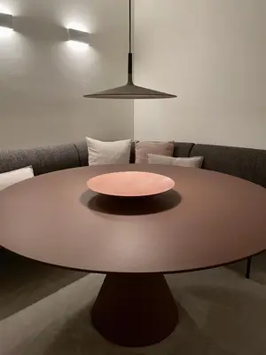 a table in a living room with a couch at Relax Select in Munte