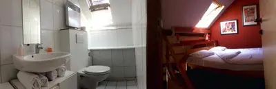 a bathroom with a sink and a toilet and a bed at Appart-hôtel Maison de la Lune - petite Auberge d'Etterbeek in Brussels
