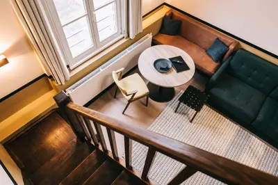 an overhead view of a living room with a table and a couch at Getaway Gent in Ghent