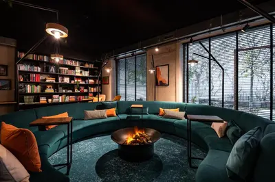 a living room with a couch and a fire pit at A-STAY Antwerp in Antwerp
