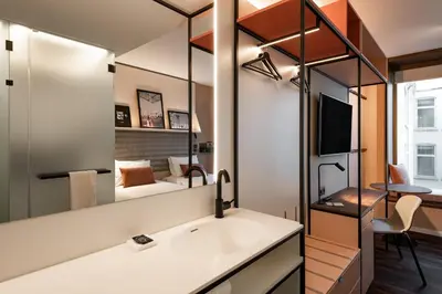 a bathroom with a sink and a mirror at A-STAY Antwerp in Antwerp