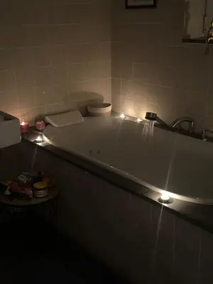 a bath tub with lights on it in a bathroom at No reservat till 20 febrBeautiful rooms at countryside Brussel in Halle