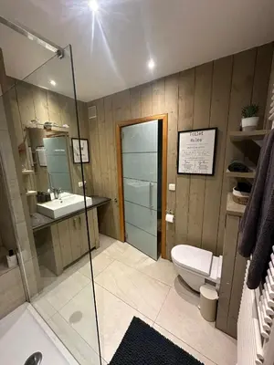 a bathroom with a shower and a toilet and a sink at No reservat till 20 febrBeautiful rooms at countryside Brussel in Halle