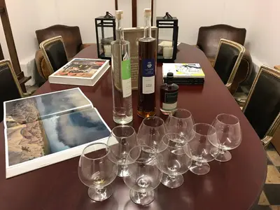 a table with wine glasses and bottles on it at Fish Market B&B in Brussels