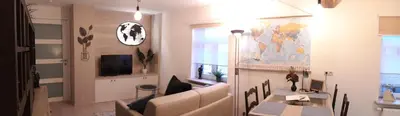 a living room with a couch and a table at Charta Appartement in Kortenberg