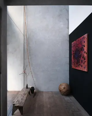 a room with a wooden bench and a painting at Shelter 7 in Ghent