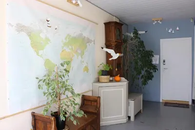a room with a map on the wall at Brussels BnB in Brussels