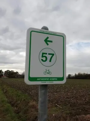 a sign on the side of a road at The Mill 2380 in Ravels