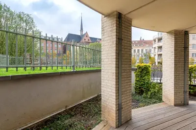 a balcony with a view of a city at EU Parliament Terrace Residence in Brussels