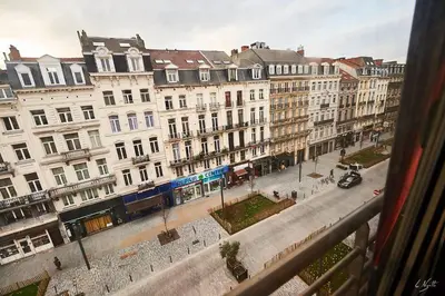 a view from a window of a city with buildings at Studio au plein centre de la ville in Brussels