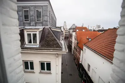 an overhead view of a city street with buildings at Luxury Suites Riverside Residence by Rikas Hotels in Antwerp