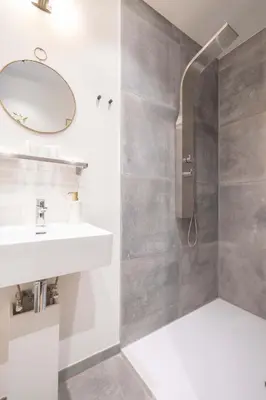 a bathroom with a sink and a shower at SHWAY - The Red Monkey in Antwerp